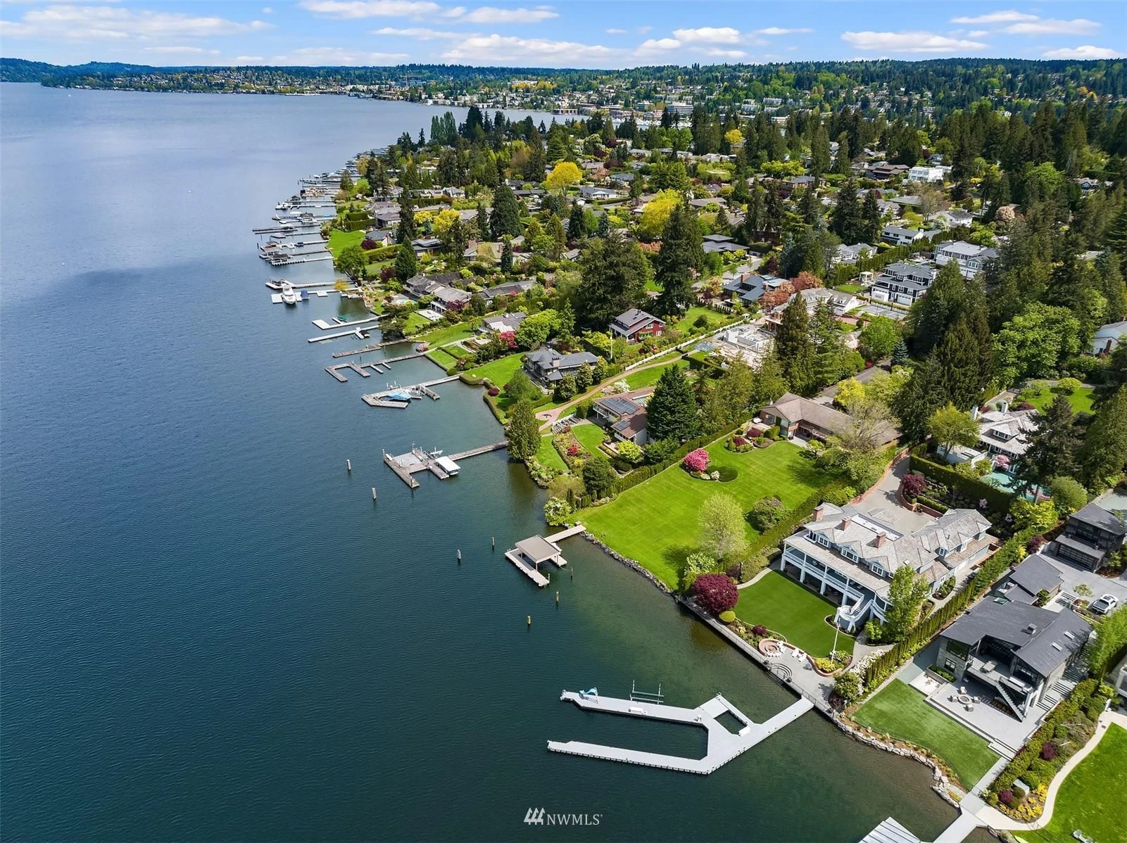 Aerial view of Yarrow Point waterfront estates on Lake Washington with private docks and manicured lawns